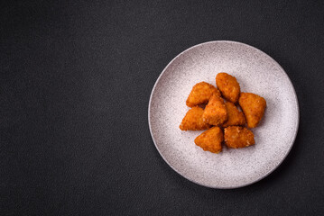 Brie cheese or camembert fries in breading, fast food, takeaway