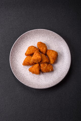 Brie cheese or camembert fries in breading, fast food, takeaway