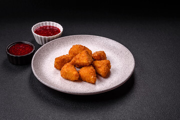 Brie cheese or camembert fries in breading, fast food, takeaway
