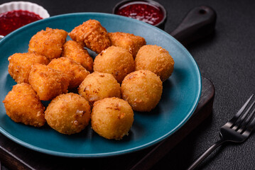 Brie cheese or camembert fries in breading, fast food, takeaway