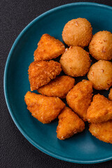 Brie cheese or camembert fries in breading, fast food, takeaway