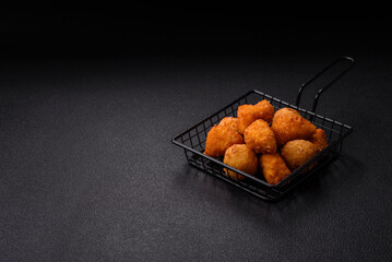 Brie cheese or camembert fries in breading, fast food, takeaway