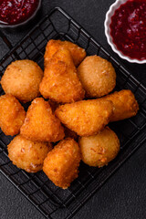 Brie cheese or camembert fries in breading, fast food, takeaway