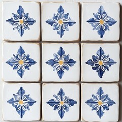 Set of blue and white tiles with a flower design