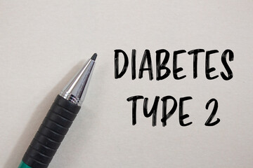 Diabetes type 2 message written on white paper with a pen. Conceptual diabetes type 2 symbol. Copy...