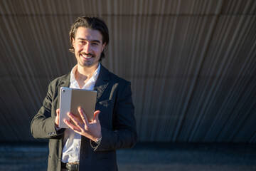Professional Portrait Of Businessman Holding Tablet, Confidently Managing Online Work, Emails, And Client Agendas With Authentic Success