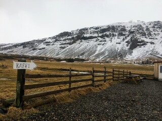 mountain landscape with coffee sign 