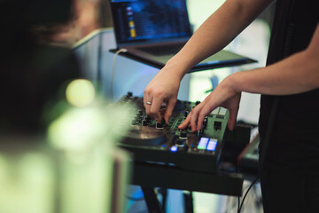 The mixer, DJ. remote for sound recording. sound amplifier mixing console equalizer. record songs and vocals. mixing tracks. audio equipment. work with musicians. 