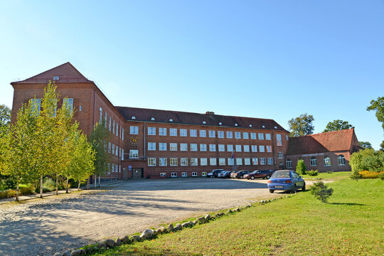 KALININGRAD REGION, RUSSIA - SEPTEMBER 15, 2016: The building of the secondary school named after A. Moiseev on a summer day. Znamensk