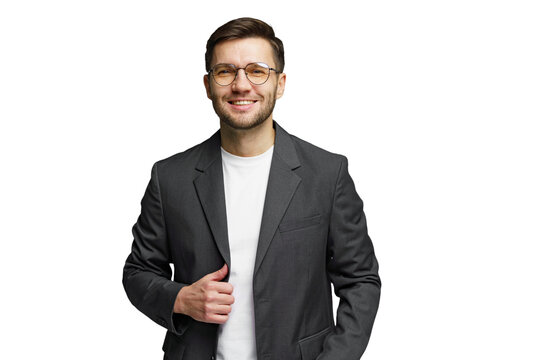 Smiling man in a suit jacket with glasses posing confidently against a white background