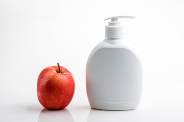 Mockup of white plastic bottle for liquid soap or shampoo with blank label.