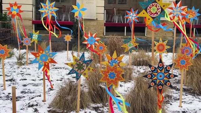 Ukrainian traditional Christmas decorations in the form of Bethlehem stars on the central square of Lviv.