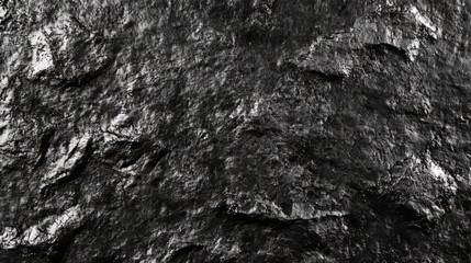 Dark, rough stone texture