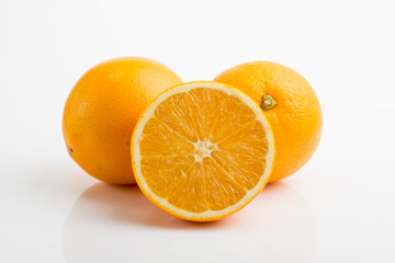 Orange fruits, halves and slices isolated on white background, clipping path, collection. Sweet...