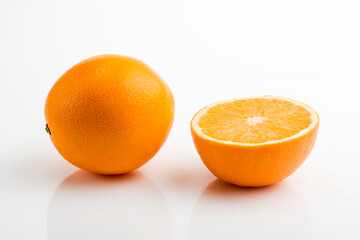 Orange fruits, halves and slices isolated on white background, clipping path, collection. Sweet orange