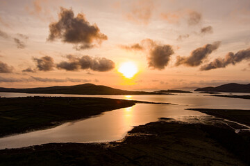 Aerial sunset view of Derreen river along the Ring of Kerry route. Rugged coast of on Iveragh Peninsula on sunset, Ireland.