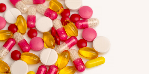 medicines, tablets and gelatin capsules with omega 3 oil. The concept of health care. Pharmaceutical preparations for the treatment of sick patients. Close-up macro photography