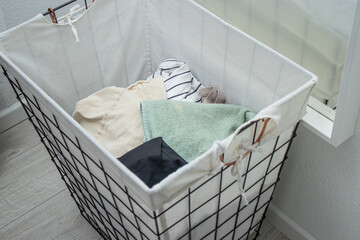 Top view of a dirt laundry on floor