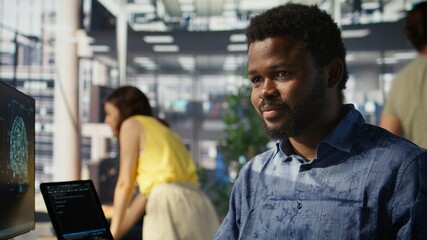 Man doing data entry, typing on keyboard on PC, solving tasks. Close up of office clerk in...