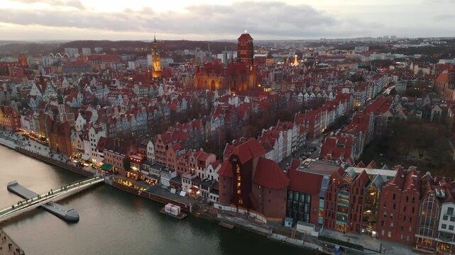 aerial flyover of gdansk city center in winter evening