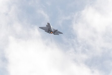 F35 doing stunts at air show and breaking sound barrier. Sonic boom