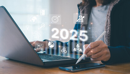 Businesswoman plan strategy marketing and finance to goal in 2025 planning business growth target...