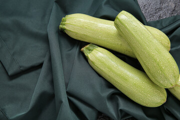 Fresh green zucchini on table