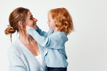 Mother and daughter bonding with a joyful smile in a heartwarming moment of love and connection