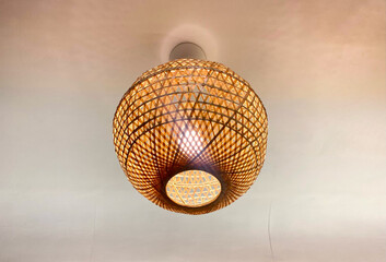 hanging lamp with brown wooden rattan weave