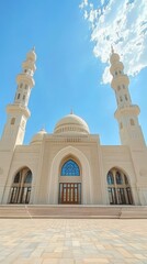 Obraz premium Stunning White Mosque Architecture Under Blue Sky