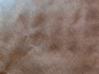 Burnt parchment paper dusted with flour