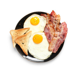 Pan with tasty fried eggs, toasts and bacon on white background. Top view