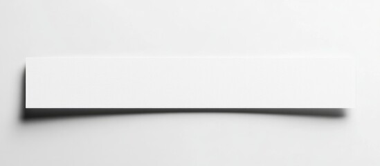 White blank banner on a light surface with soft shadow isolated on white background Copy Space