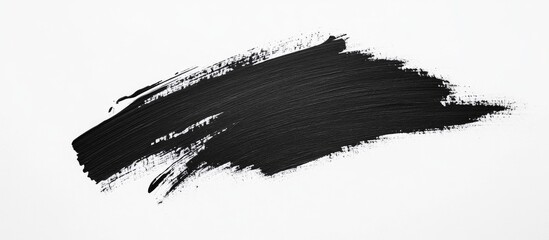 Black paint brush stroke on white background with Copy Space for text placement