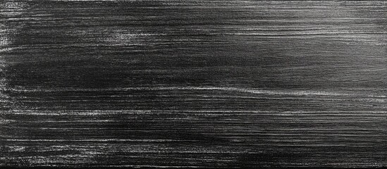 Obraz premium Black brushed metal texture with subtle scratches and lines, suitable for backgrounds with Copy Space.