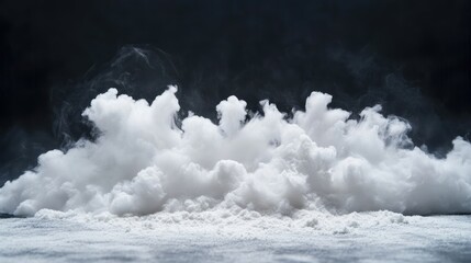 Obraz premium Fluffy White Smoke or Powder Cloud Isolated on Dark Background for Creative and Abstract Designs