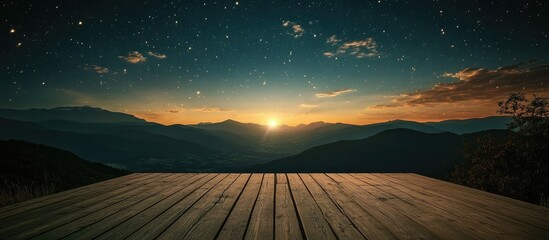 Scenic wooden table overlooking mountains at sunset under a starry moonlit sky perfect for decorative arrangements and serene moments