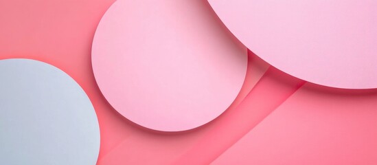 Pastel geometric shapes in flat design showcasing pink and blue hues with ample copyspace for text and creative design applications