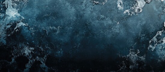 Obraz premium Abstract marble texture in shades of blue and dark gray with ample space for text or graphic overlays in modern design projects