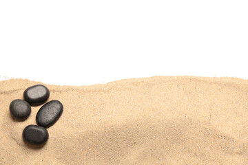 Light beach sand with black pebbles on white background