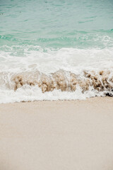 Waves of turquoise water Beach. Beautiful sandy beach and blue sea waves