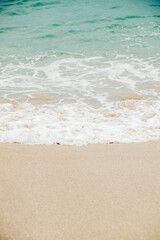 Waves of turquoise water Beach. Beautiful sandy beach and blue sea waves