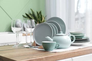 Clean blue plates on counter in kitchen