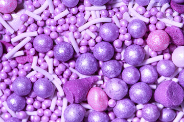 Texture of violet sprinkles as background, closeup