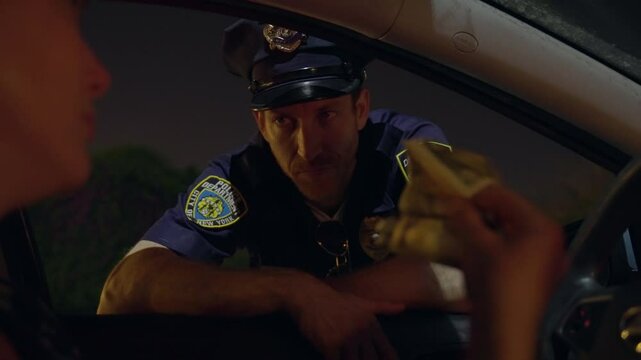 Police officer leans into the window of a car, Driver offers money. The officer refusing the bribe. Cop rejection of unethical behavior, emphasizing professionalism during a routine traffic stop.