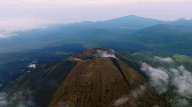 Panoramic view of Paricutin Volcano amidst clouds and Michoacan valleys