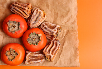 A fresh persimmons on paper