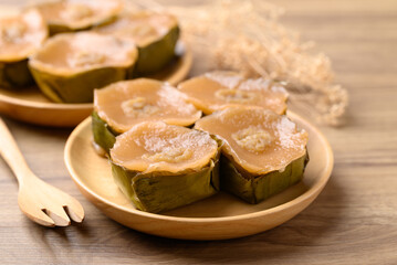 Sticky rice cake (Nian Gao), Chinese New Year cake on wooden plate