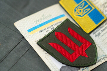 Ukrainian military ID and chevron of the Ukrainian army. Documents of a serviceman of Ukraine....