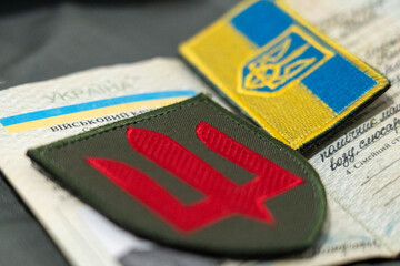 Ukrainian military ID and chevron of the Ukrainian army. Documents of a serviceman of Ukraine....